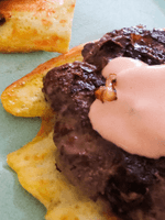 beefburgers with a tangy sauce