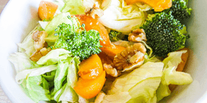 apricot, walnut and broccoli salad in a bowl