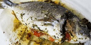 sea bream stuffed with shallots and tomatoes